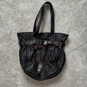 Stylish Black Leather Tote with Buckle Straps
